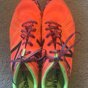 Bright orange Track spikes